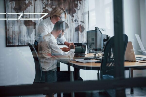 Two people working together